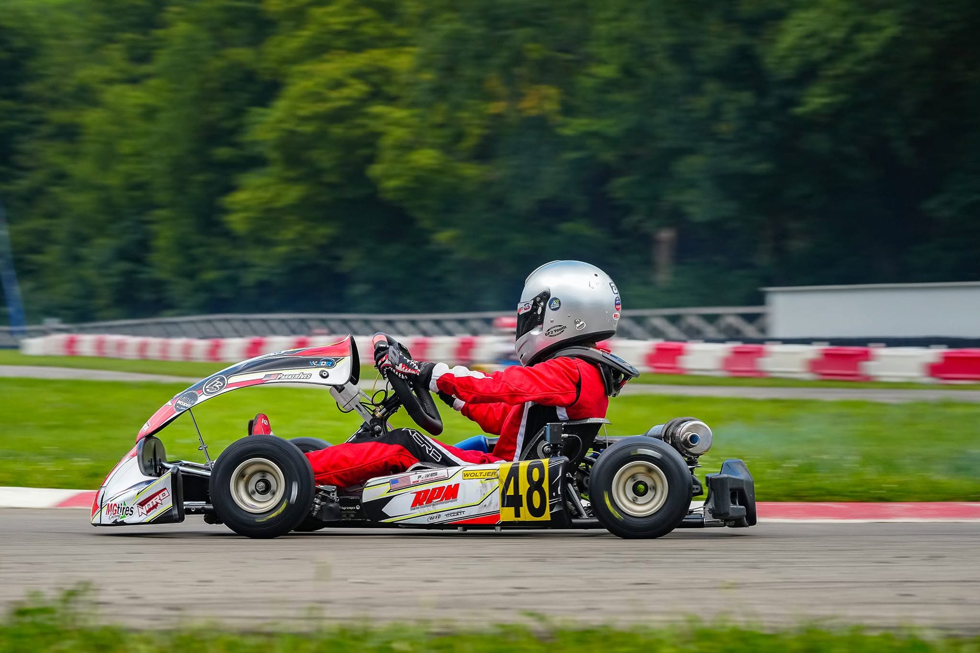 Nitro Kart / Ryan Perry Motorsport machinery on a national road course.